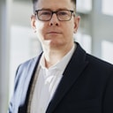 Portrait of a senior business executive — Metrion client community.