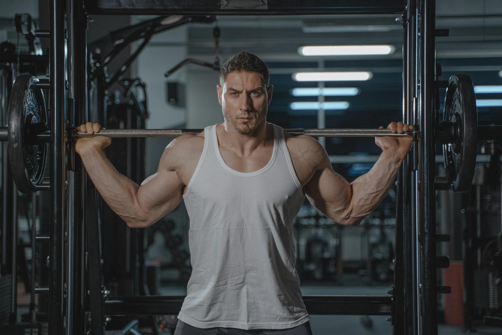 Gym Management Software context with trainer-led collaboration in a fitness environment.