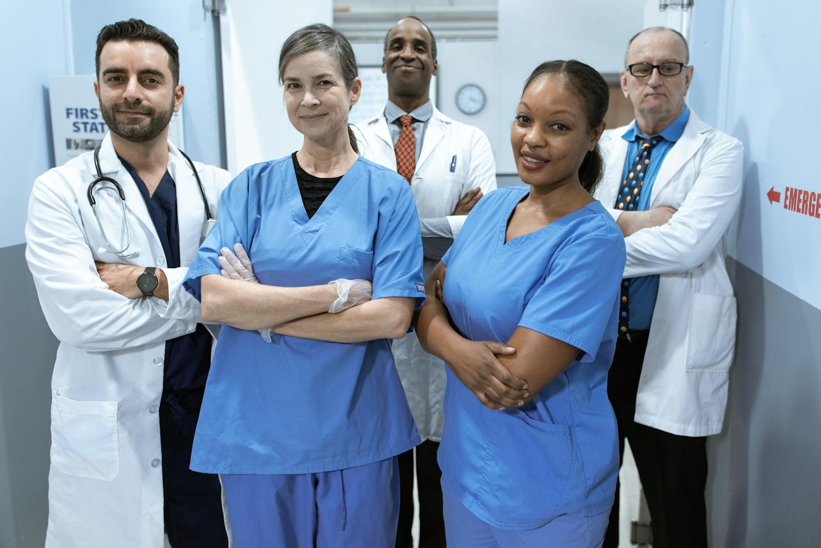 Hospital Management System context with healthcare teams reviewing information together.